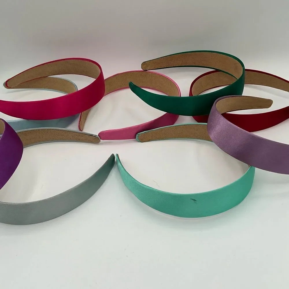 7 Colorful Women/girls Headband Set- new, a couple spots from dye transfer